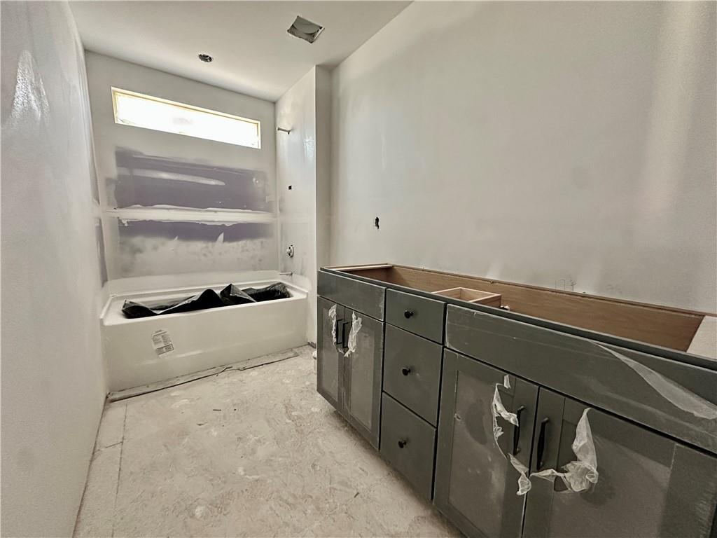 162 Marble Tree Way Ball Ground, GA 30107 - Photo 13 of 38 a room with storage and utility