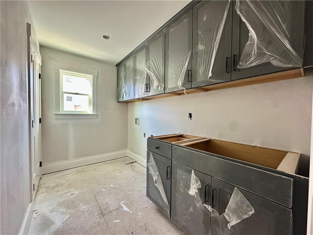 162 Marble Tree Way Ball Ground, GA 30107 - Photo 17 of 38 a utility room with dryer and washer