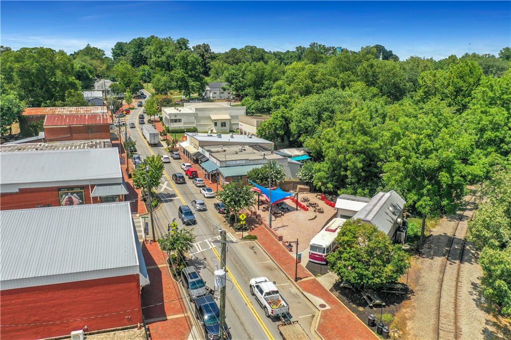 162 Marble Tree Way Ball Ground, GA 30107 - Photo 37 of 38 an aerial view of a house with outdoor space