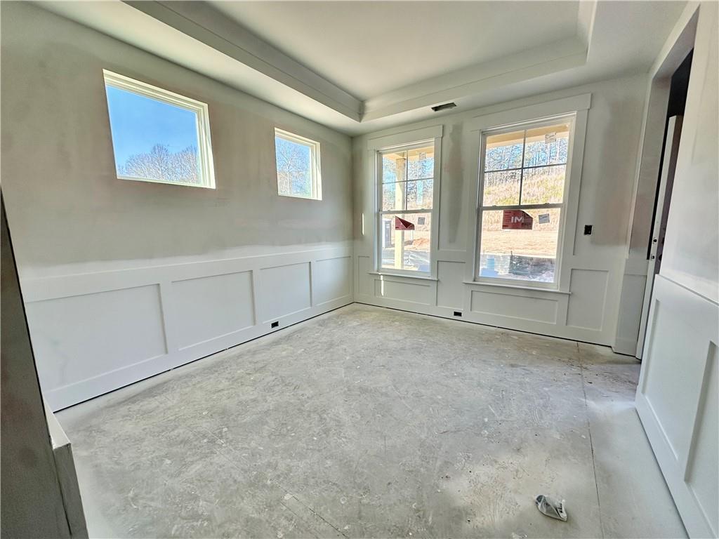 162 Marble Tree Way Ball Ground, GA 30107 - Photo 10 of 38 an empty room with windows