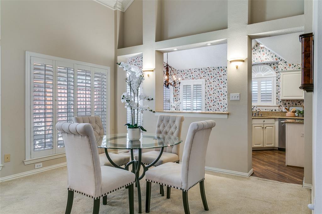 14596 Blueberry Court Addison, TX 75001 - Photo 15 of 32 Carpeted dining area with baseboards and a high ceiling