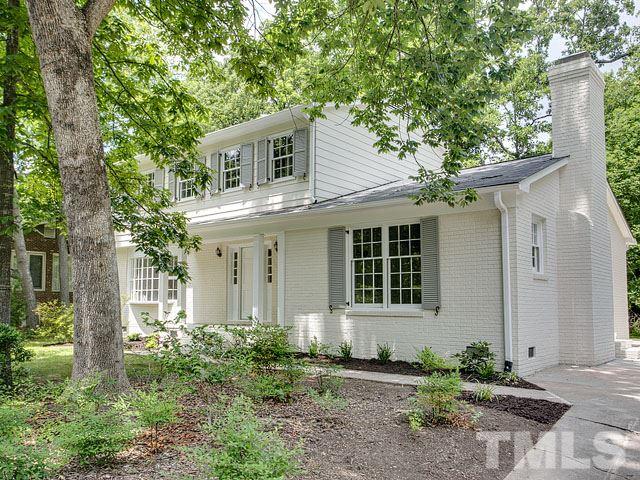 1937 Fountain Ridge Road Chapel Hill, NC 27517 - Photo 2 of 24 a front view of a house with garden