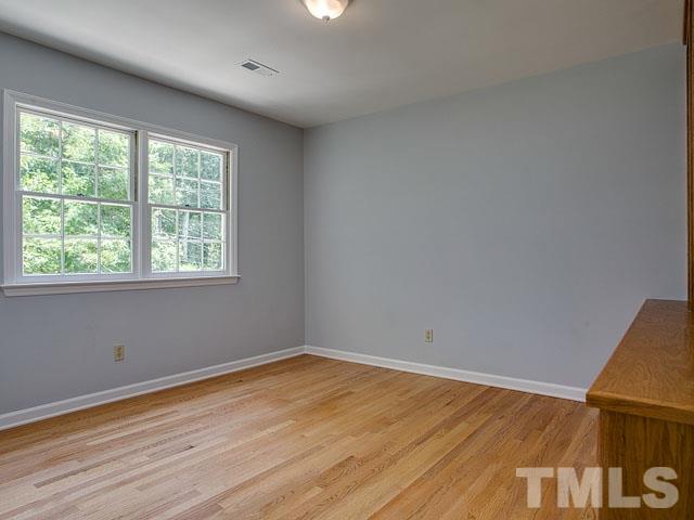 1937 Fountain Ridge Road Chapel Hill, NC 27517 - Photo 17 of 24 a view of a room with wooden floor and window