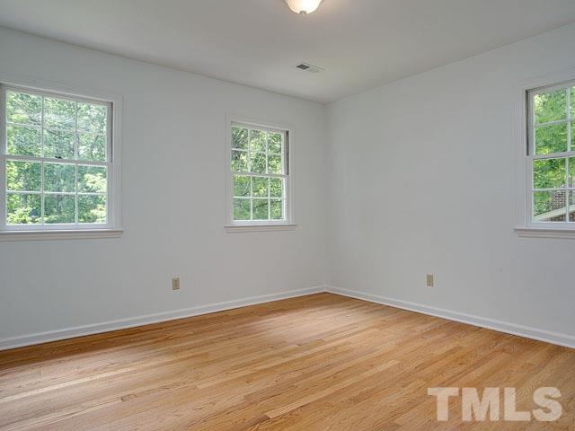 1937 Fountain Ridge Road Chapel Hill, NC 27517 - Photo 20 of 24 a view of a room with wooden floor and window