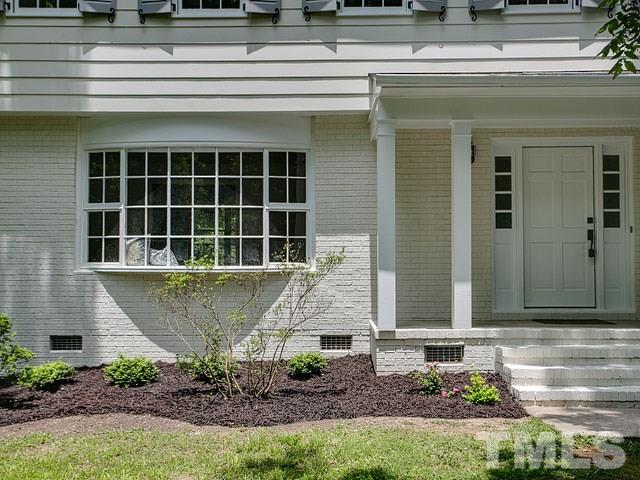 1937 Fountain Ridge Road Chapel Hill, NC 27517 - Photo 3 of 24 a front view of a house