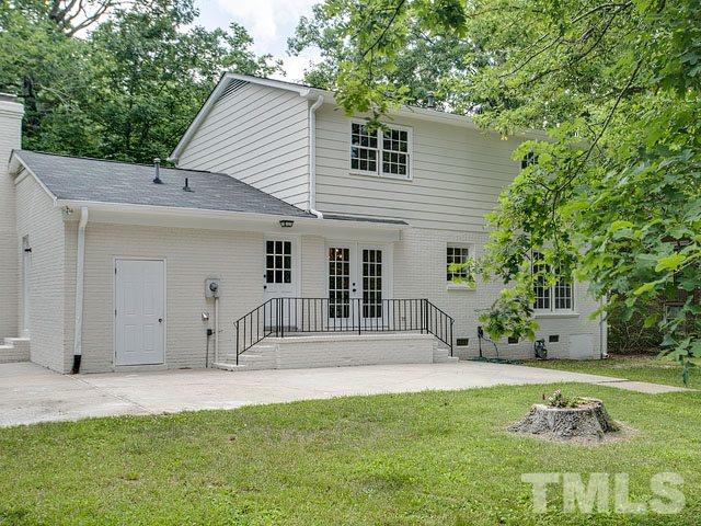 1937 Fountain Ridge Road Chapel Hill, NC 27517 - Photo 22 of 24 a front view of a house with a yard