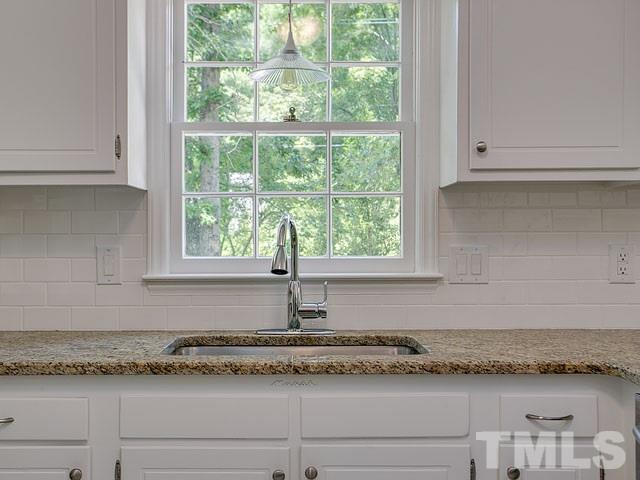1937 Fountain Ridge Road Chapel Hill, NC 27517 - Photo 9 of 24 a bathroom with granite countertop window and a granite counter tops