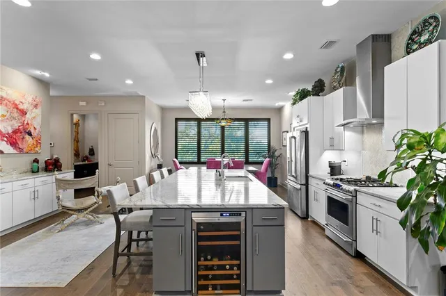 a view of a dining room with furniture and window