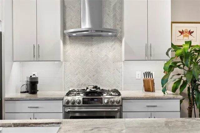 a patio with table and chairs