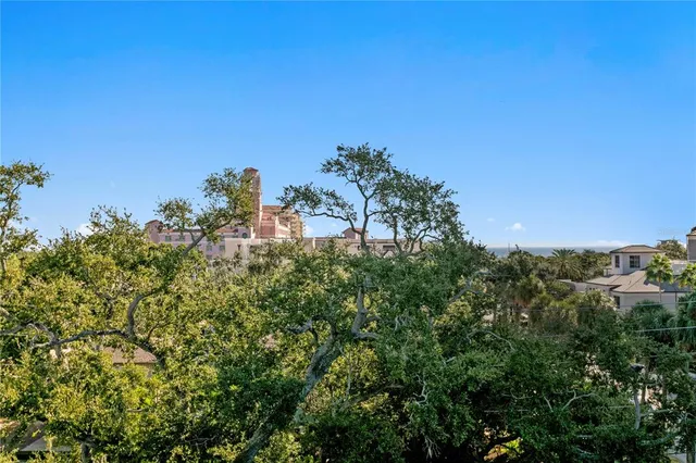 a front view of house with an outdoor space and seating