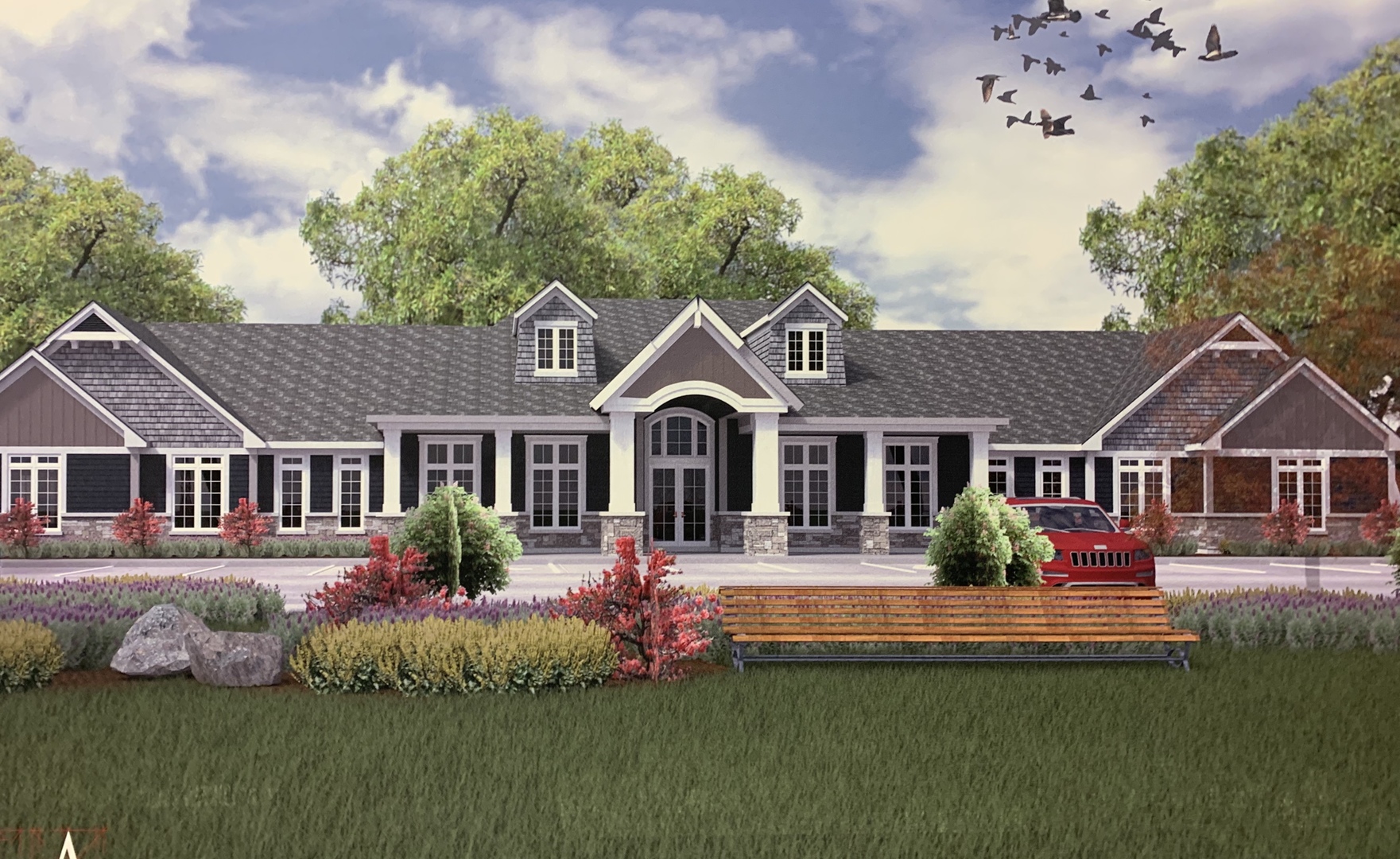 a front view of a house with garden