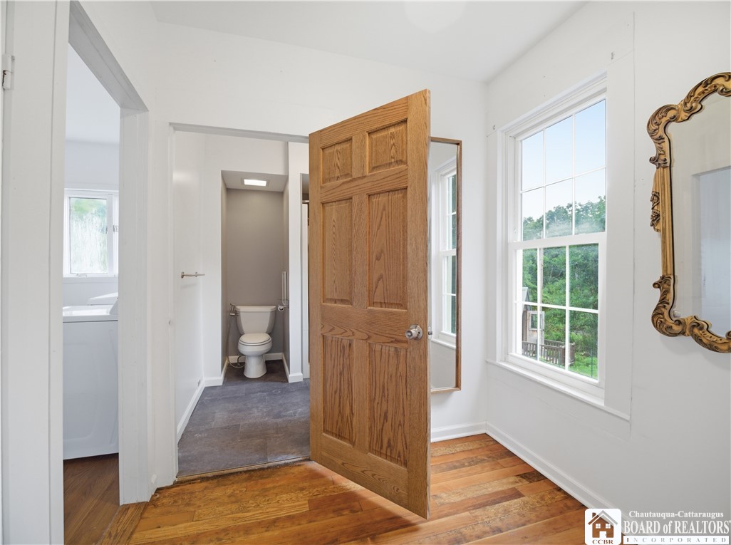 9741 East Lake Road Ripley, NY 14775 - Photo 19 of 45 The primary suite offers a delightful attached dressing room and full bathroom.