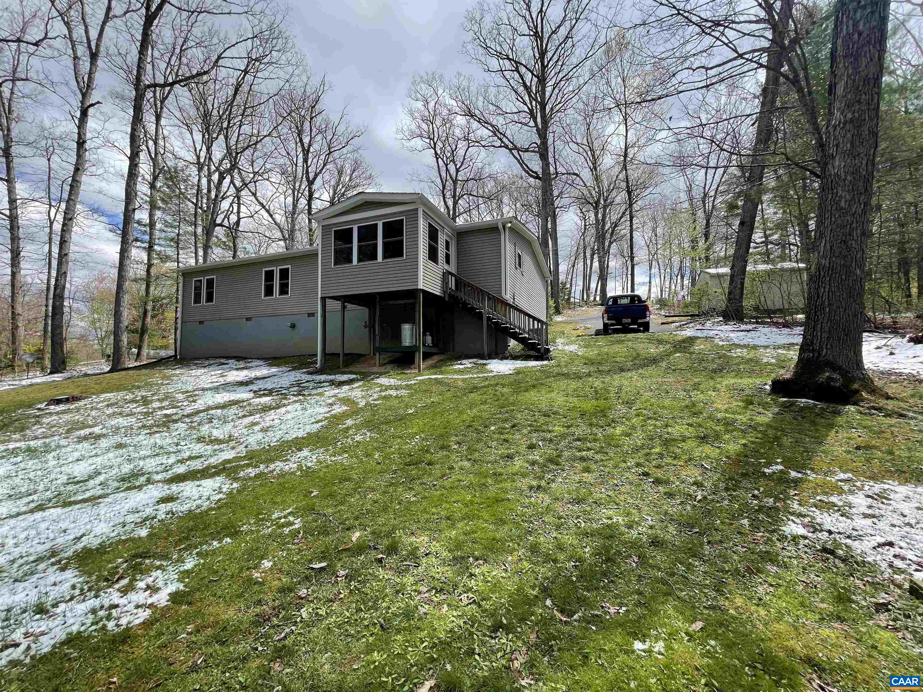558 Stover Shop Road Churchville, VA 24421 - Photo 3 of 42 a view of a house with a yard covered with trees