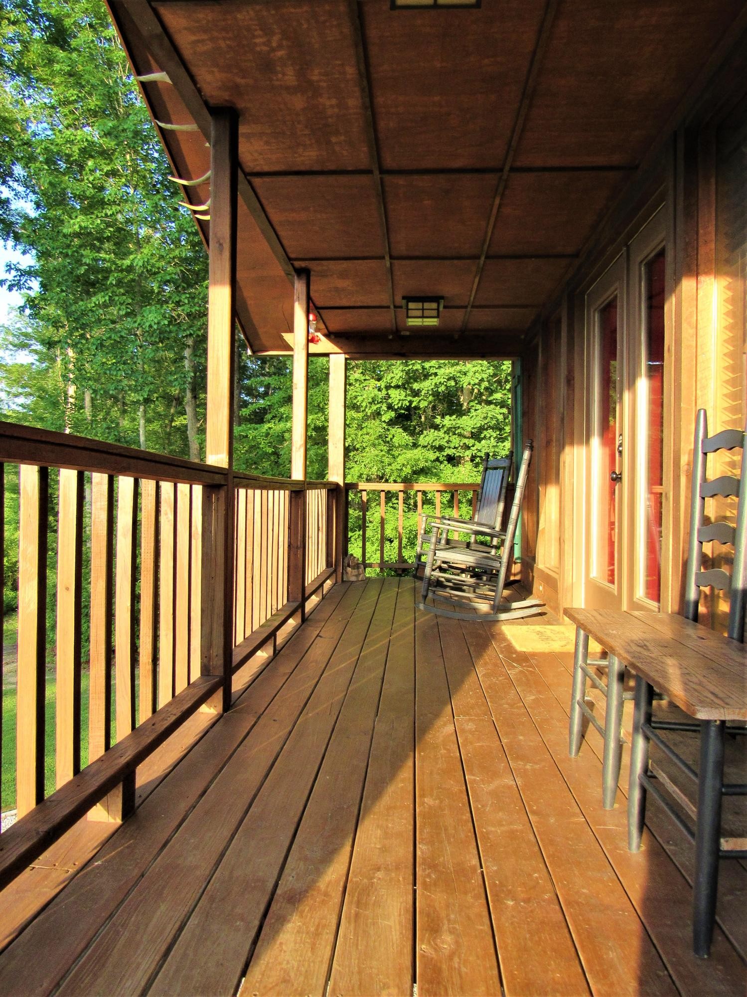 228 Ridge Road Lancing, TN 37770 - Photo 3 of 40 a view of balcony with wooden floor
