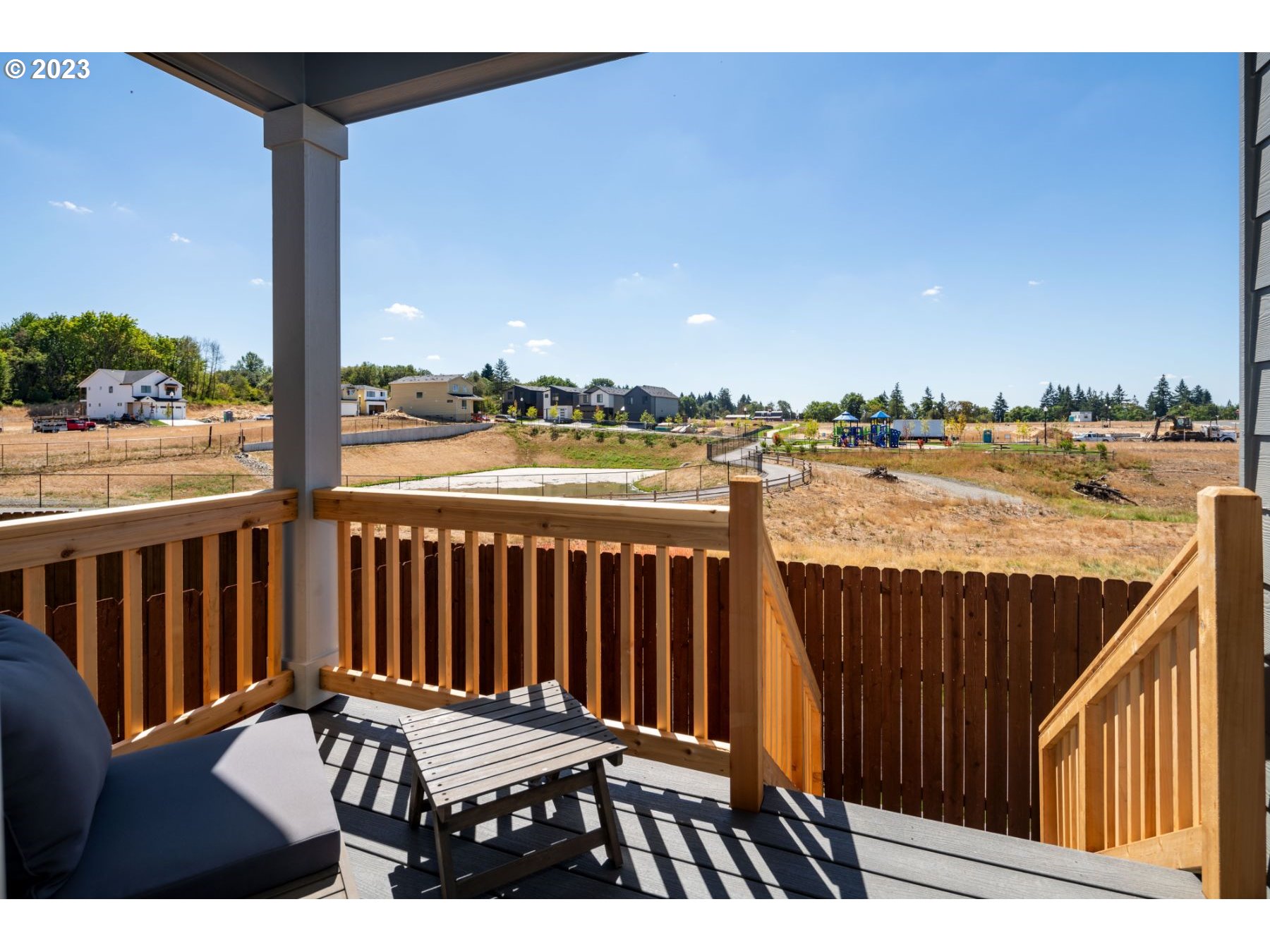 813 Northwest 178th Street Ridgefield, WA 98642 - Photo 21 of 21 a view of a balcony with wooden floor and outdoor space