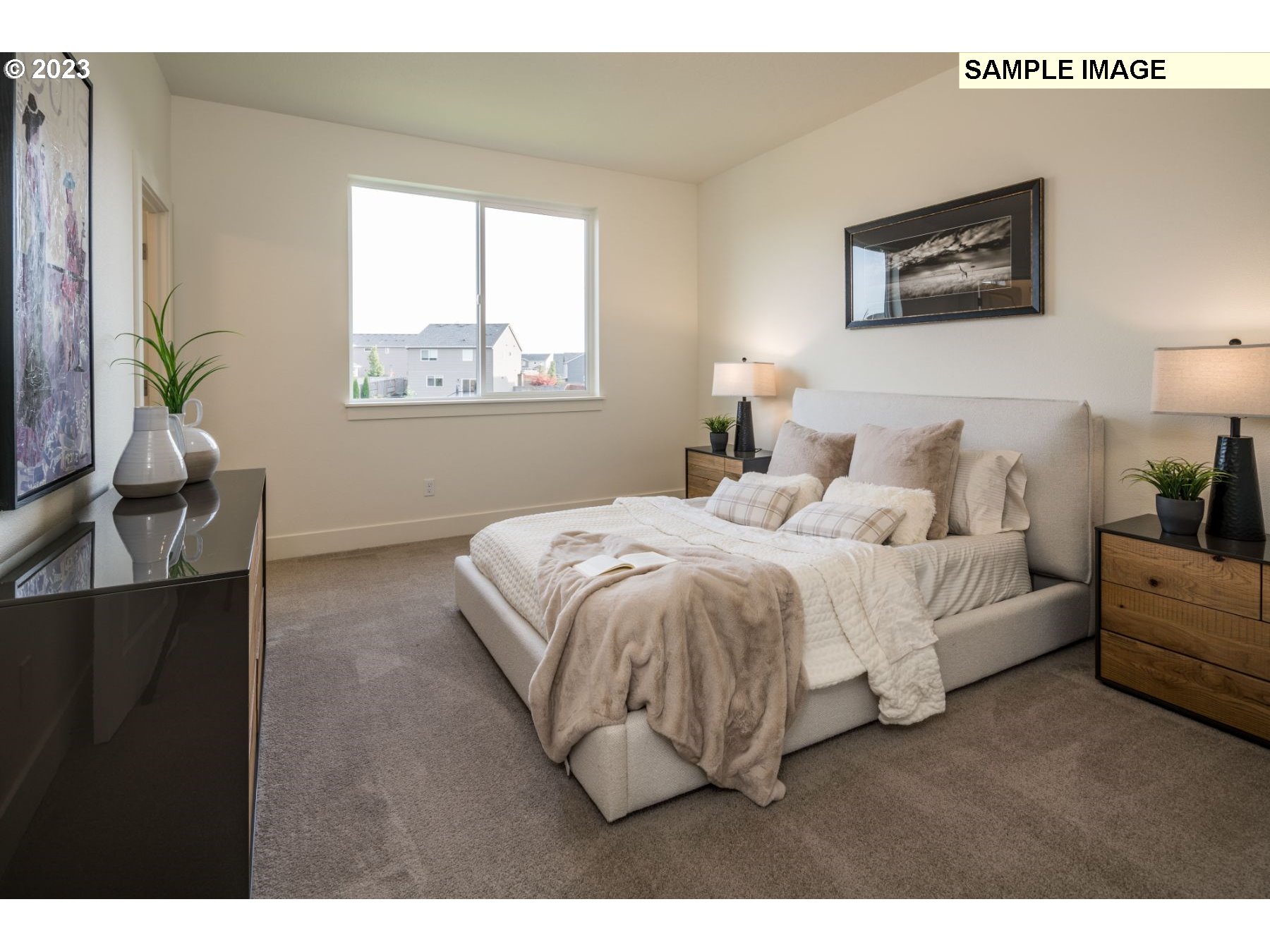 813 Northwest 178th Street Ridgefield, WA 98642 - Photo 7 of 21 a bed room with a bed and a painting
