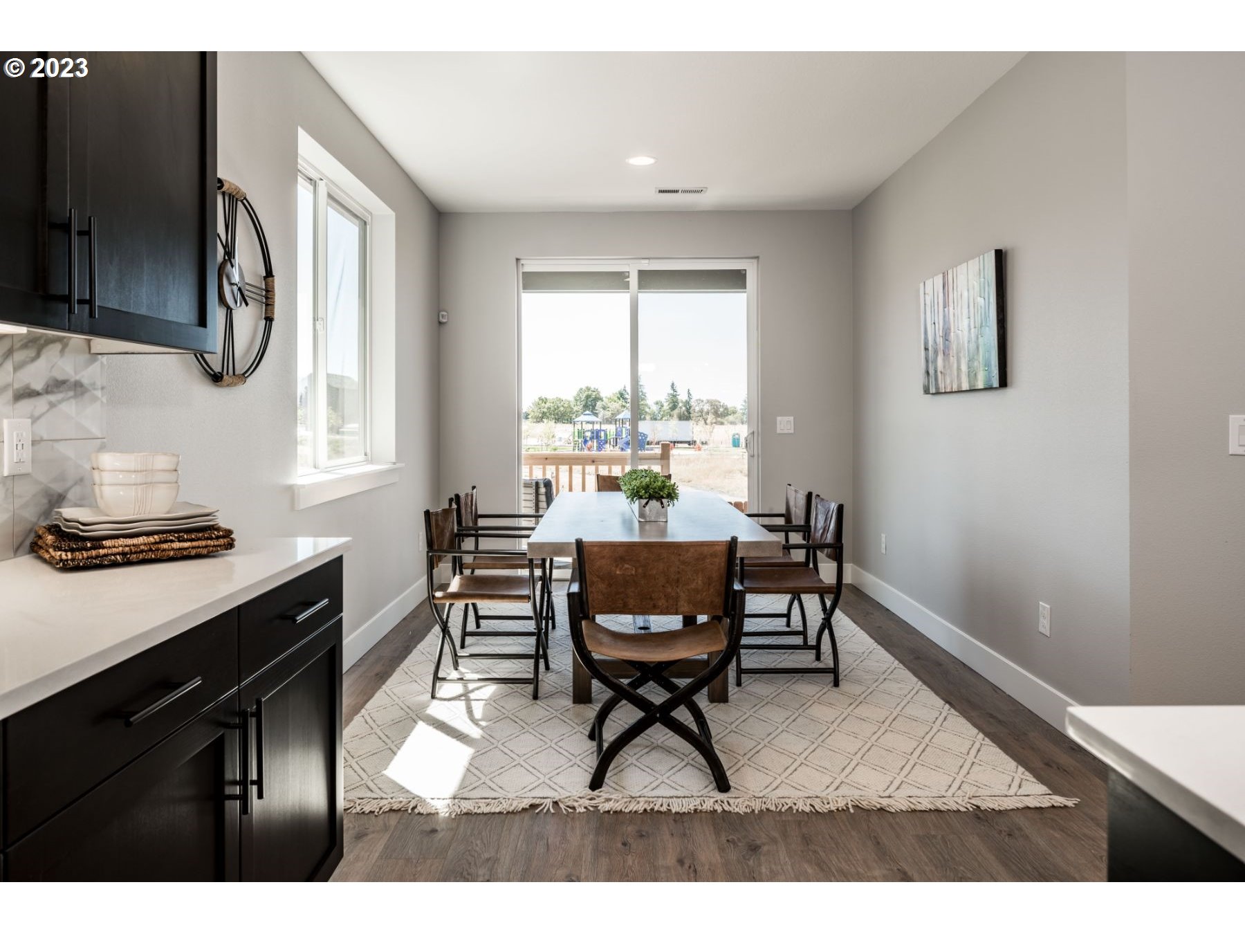 813 Northwest 178th Street Ridgefield, WA 98642 - Photo 10 of 21 a workspace with furniture window and wooden floor