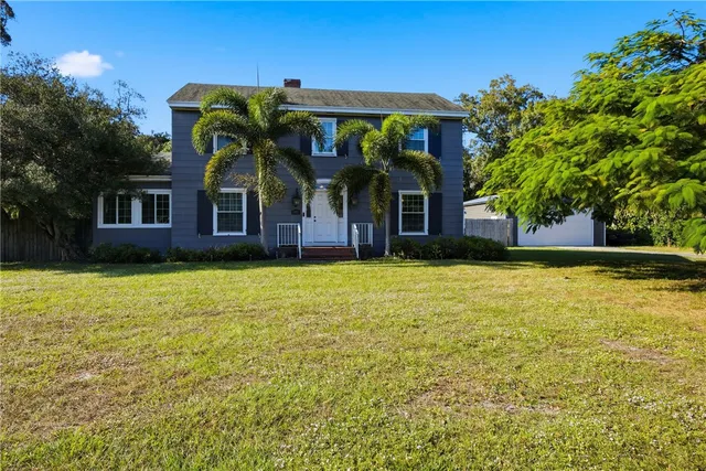a view of a house with a swimming pool