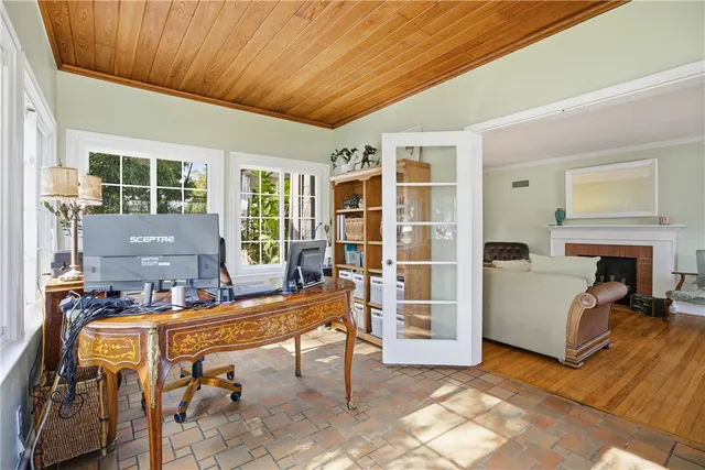 a work room with furniture and a fireplace
