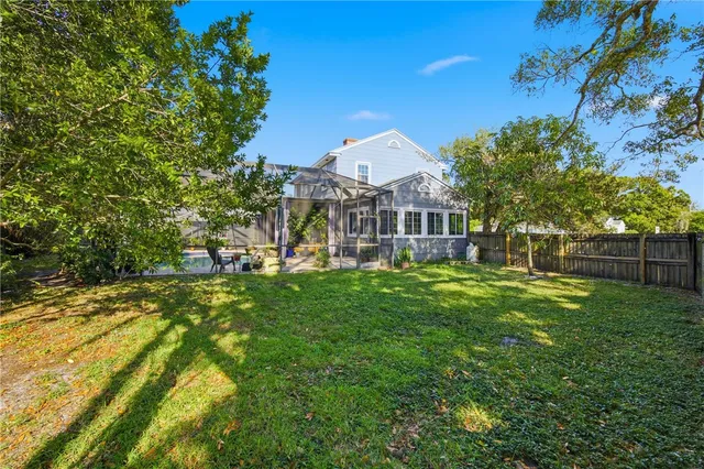a view of a house with a big yard