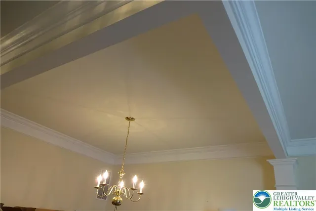 a view of a chandelier fan