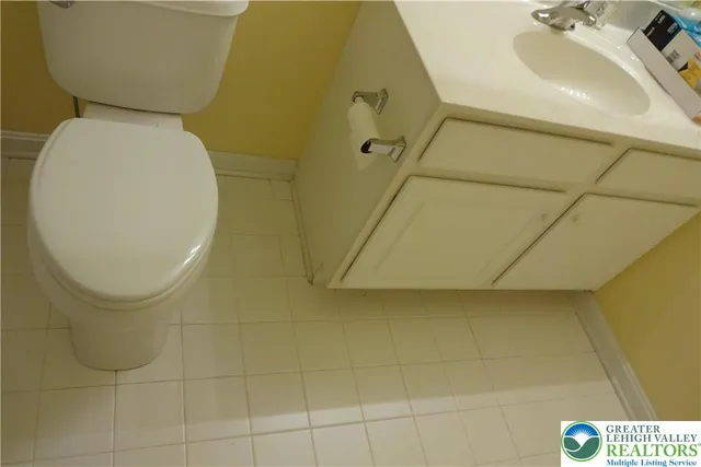 a bathroom with a sink and toilet