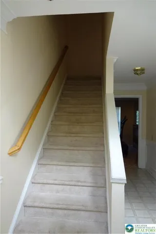 a view of a hardwood floor in a room