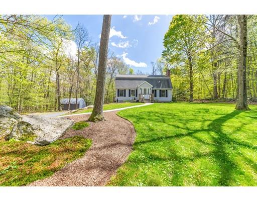 125 Thayer Road Monson, MA 01057 - Photo 3 of 30 a view of a house with a big yard and palm trees