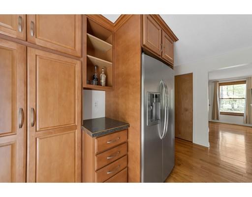 125 Thayer Road Monson, MA 01057 - Photo 9 of 30 a kitchen with stainless steel appliances granite countertop a refrigerator and a sink