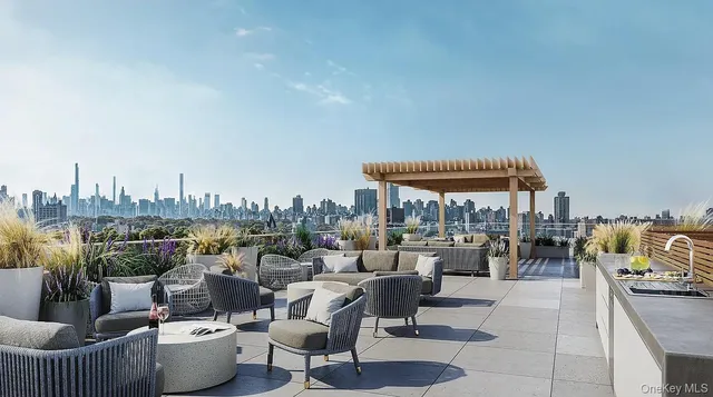 a living room with furniture a window and a table