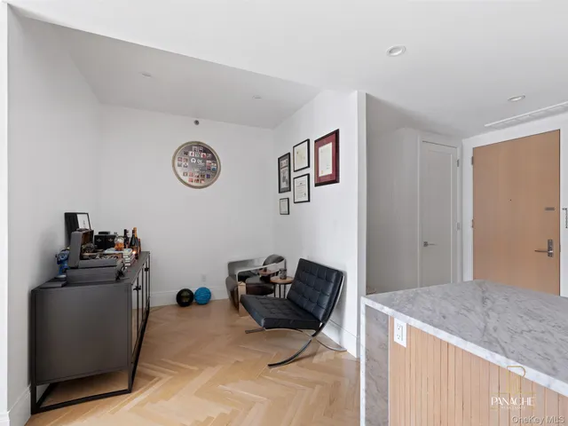 a view of a workspace with furniture