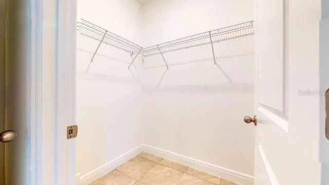 a view of a room with racks on the wall