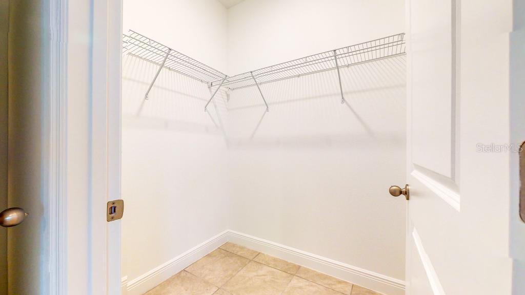 9809 North Swanee Terrace Dunnellon, FL 34433 - Photo 15 of 24 a view of a room with racks on the wall