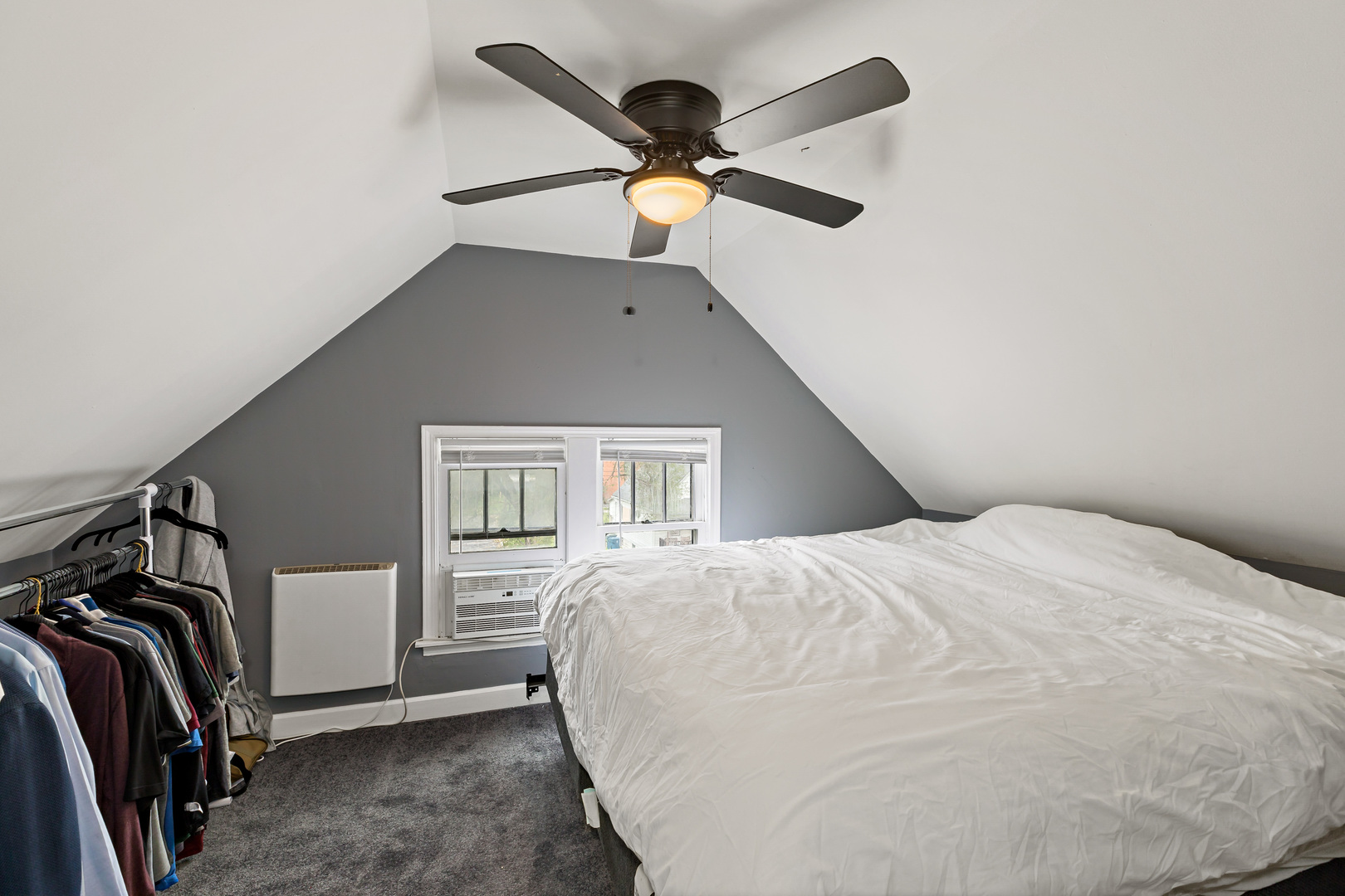 3441 Chicago Road Steger, IL 60475 - Photo 14 of 28 a bedroom with a bed and cabinets