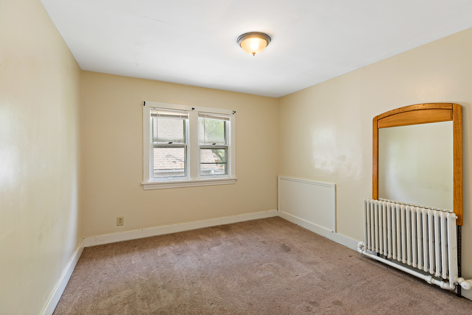 3441 Chicago Road Steger, IL 60475 - Photo 5 of 28 a view of an empty room with a window