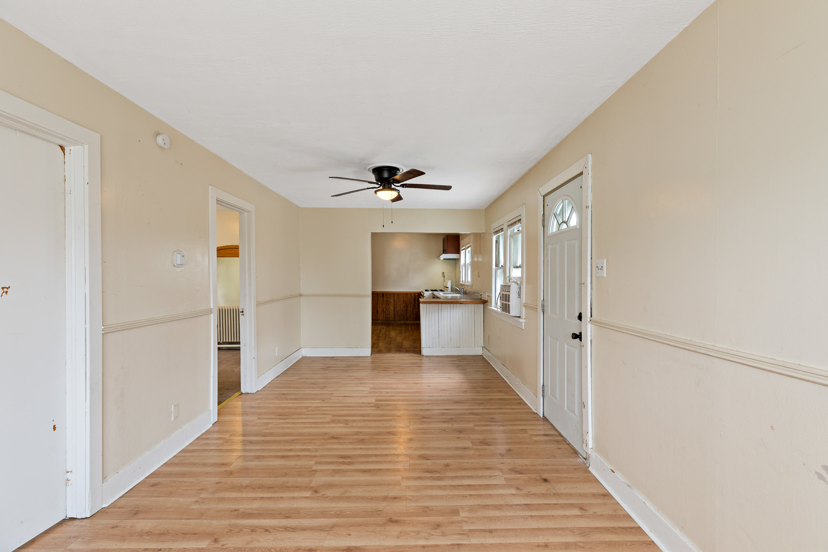 3441 Chicago Road Steger, IL 60475 - Photo 7 of 28 a view of a hallway with wooden floor