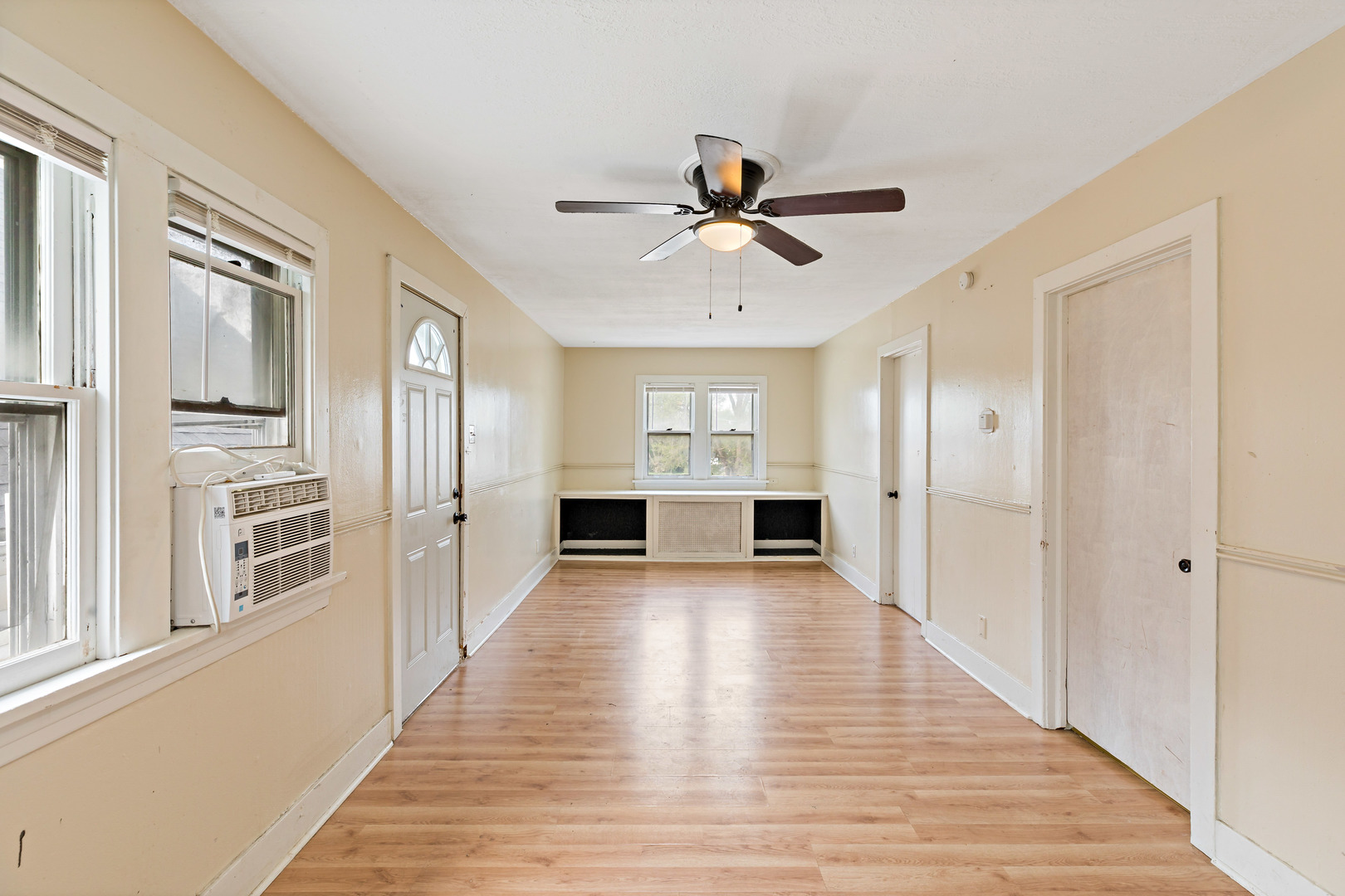 3441 Chicago Road Steger, IL 60475 - Photo 8 of 28 a view of a living room with wooden floor