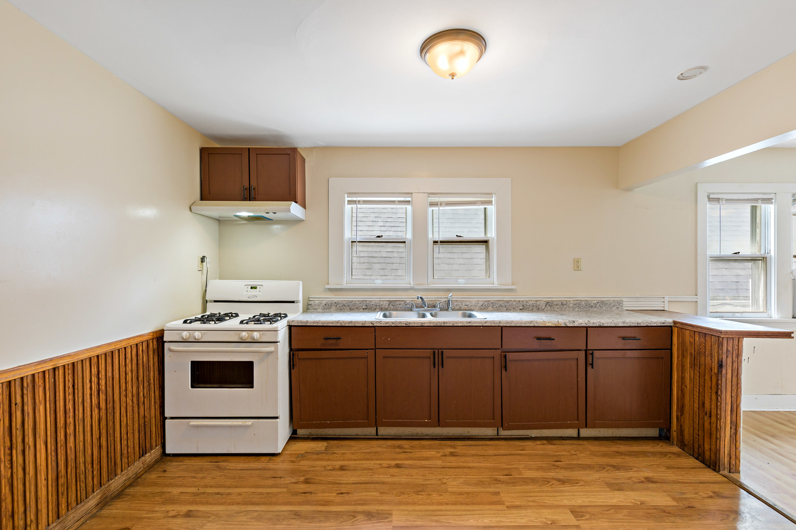 3441 Chicago Road Steger, IL 60475 - Photo 10 of 28 a kitchen with a stove and a sink