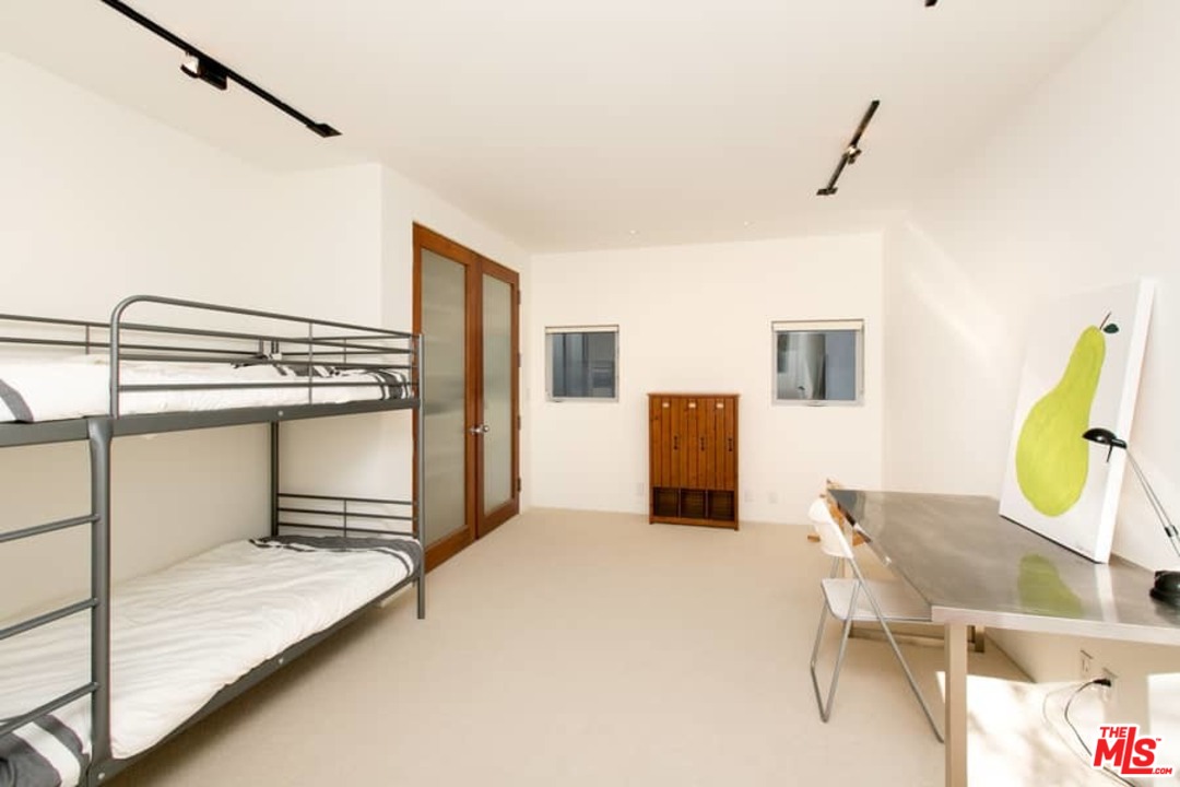 216 Grand Boulevard Venice, CA 90291 - Photo 18 of 28 a view of a kitchen with furniture and a refrigerator