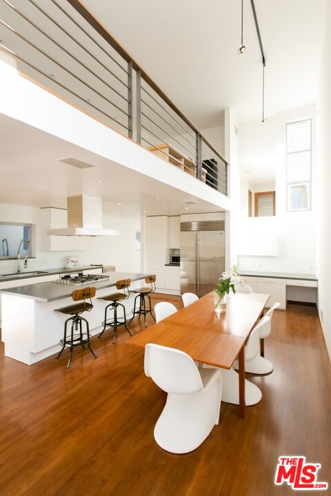 216 Grand Boulevard Venice, CA 90291 - Photo 9 of 28 a living room with dining room and wooden floor