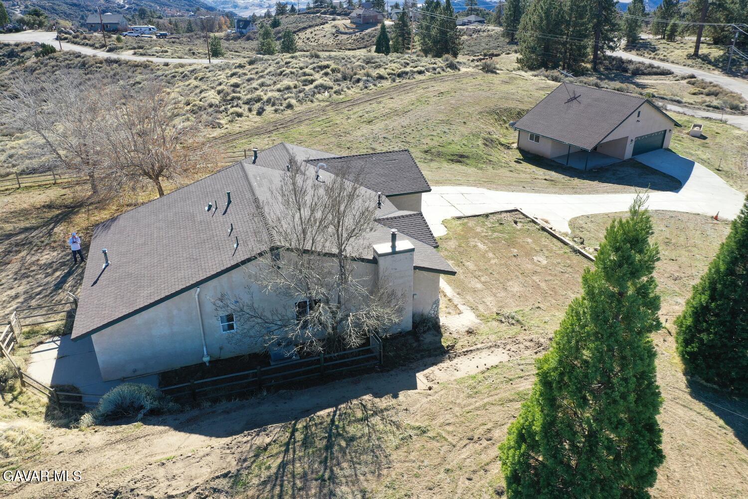 26801 Cabriolet Court Tehachapi, CA 93561 - Photo 3 of 60 a view of a house with a yard