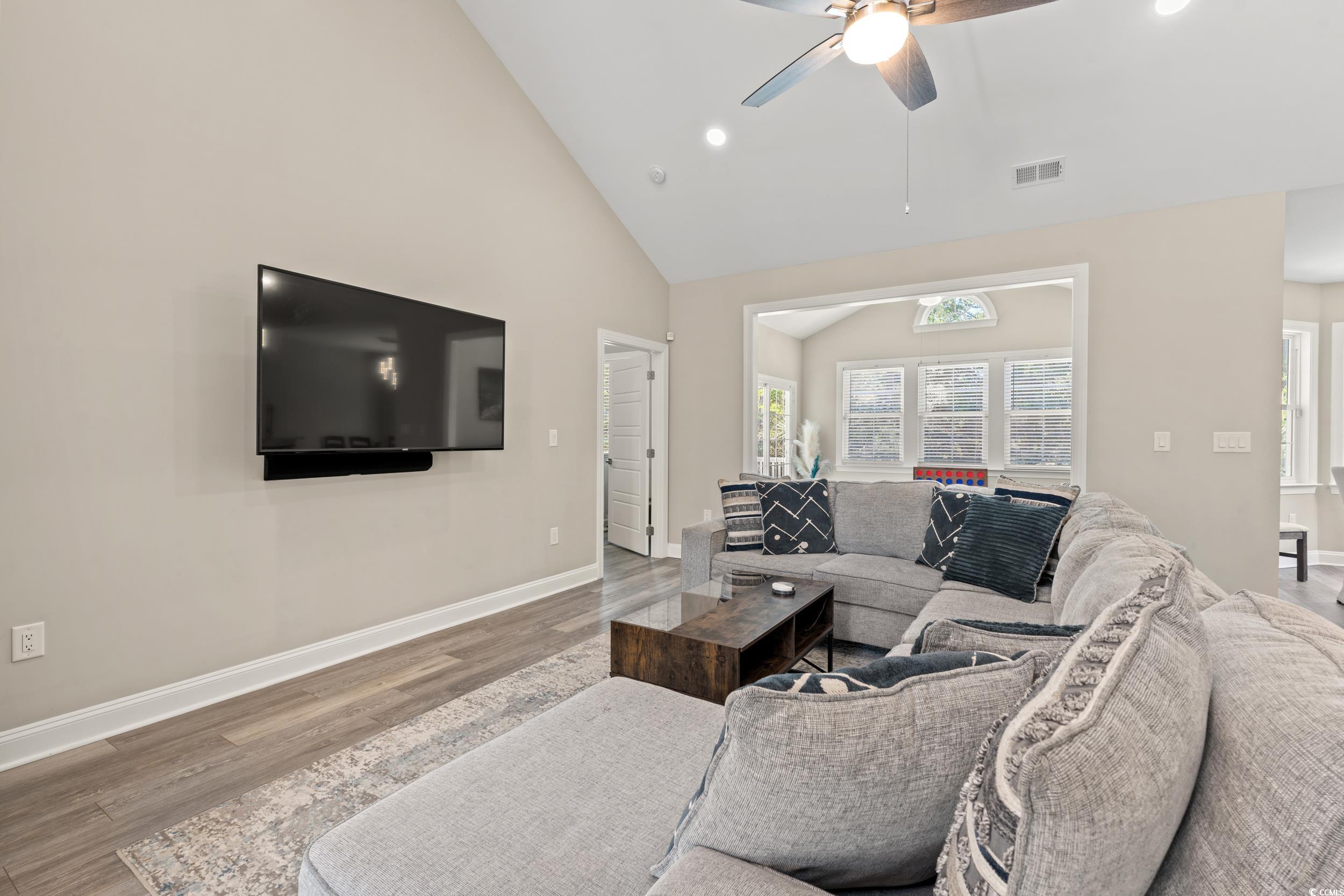 714 Charlotte Road Myrtle Beach, SC 29577 - Photo 7 of 30 Living room with recessed lighting, high vaulted ceiling, wood finished floors, and a ceiling fan