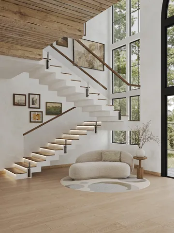 a living room with a couch and a flat screen tv