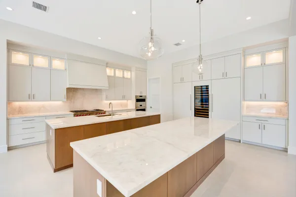 a view of a balcony with chairs