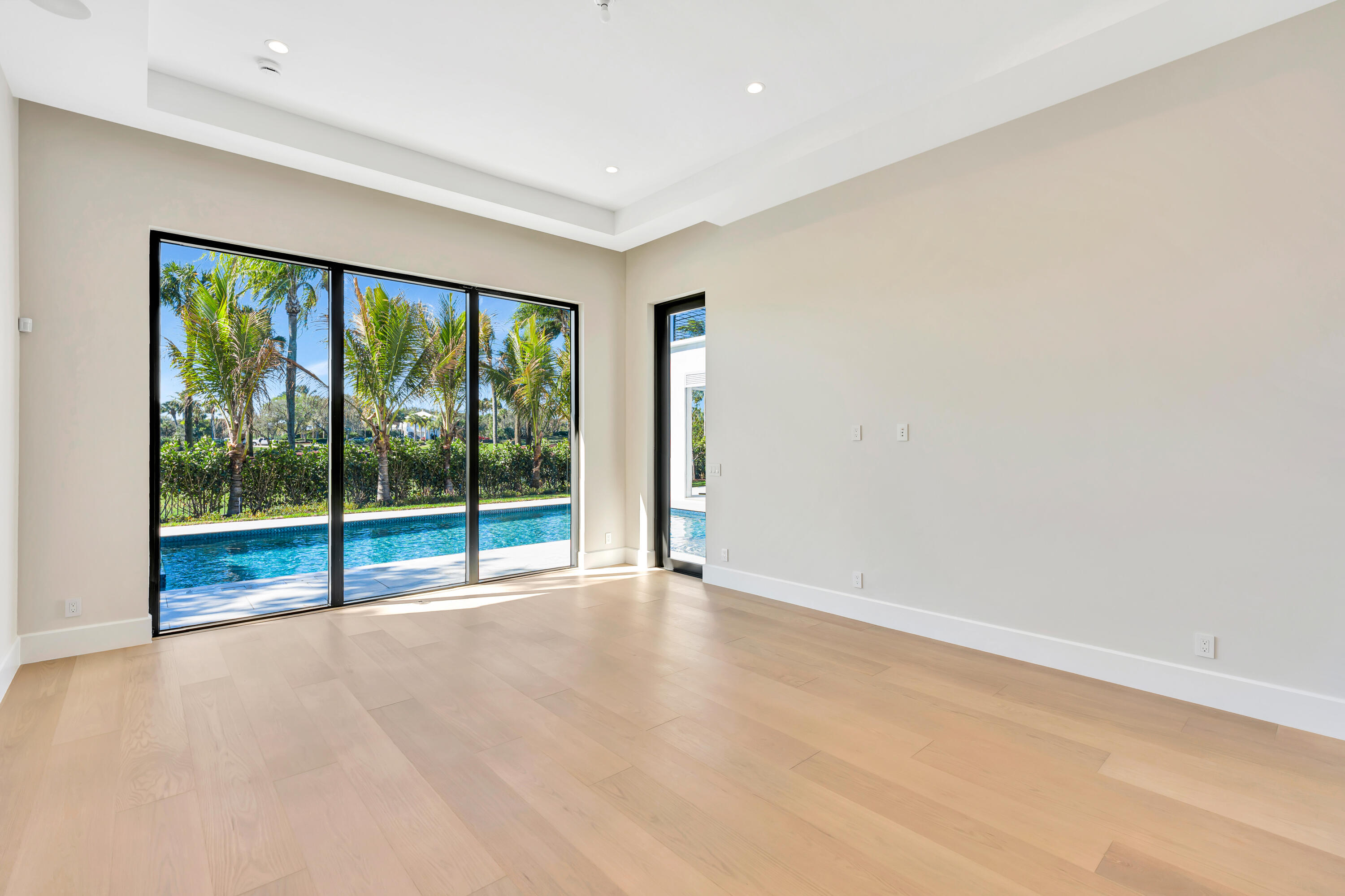 112 Regatta Drive Jupiter, FL 33477 - Photo 36 of 85 a view of an empty room with glass door