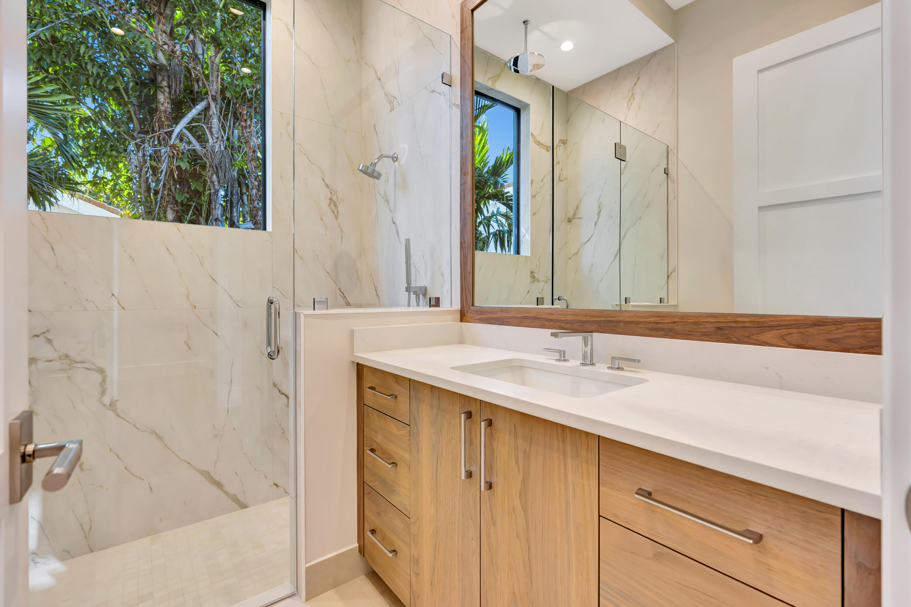 112 Regatta Drive Jupiter, FL 33477 - Photo 38 of 85 a bathroom with a granite countertop sink and a mirror