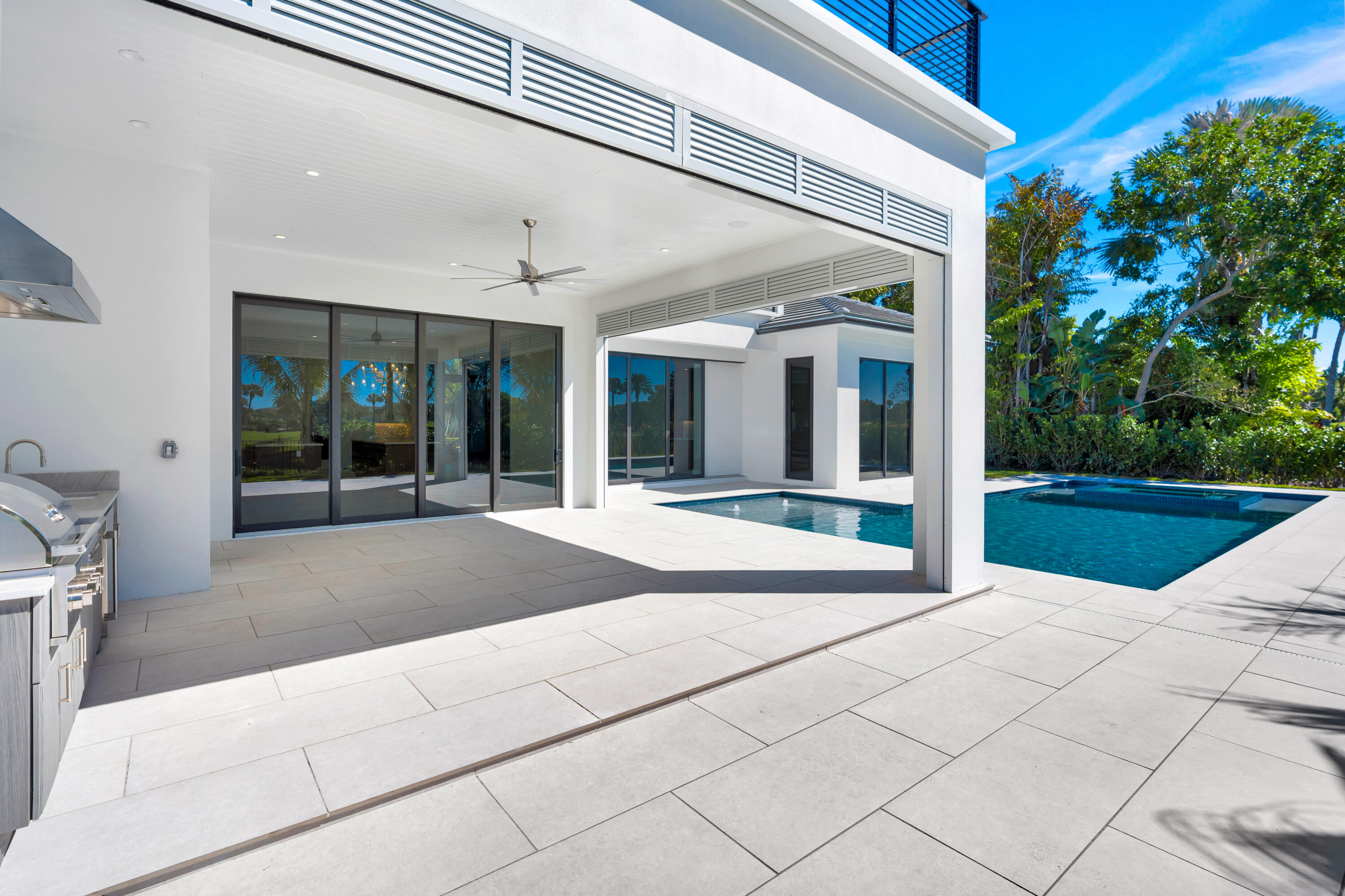112 Regatta Drive Jupiter, FL 33477 - Photo 56 of 85 a view of swimming pool with an outdoor seating