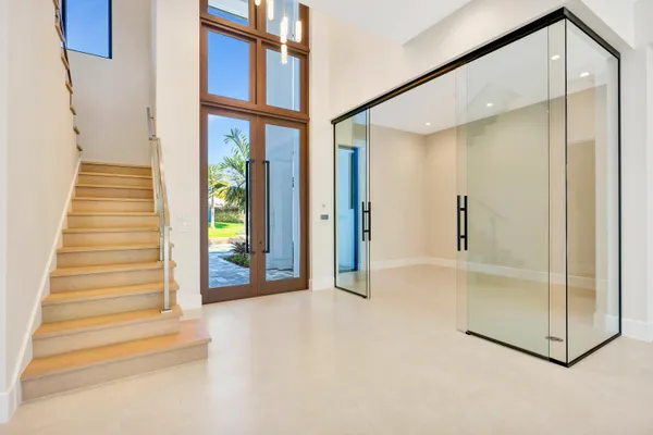 wooden floor in an empty room with window