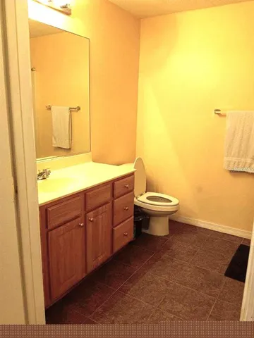 a bathroom with a sink and a toilet