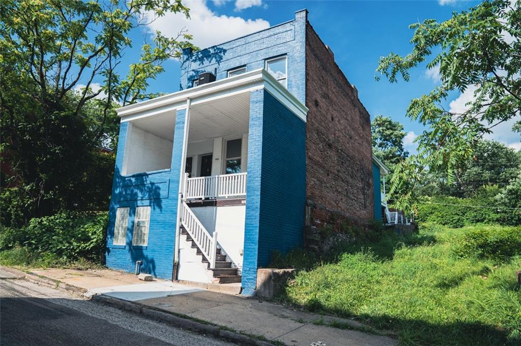 620 Kirkpatrick Street Pittsburgh, PA 15219 - Photo 3 of 15 front view of a house with a street